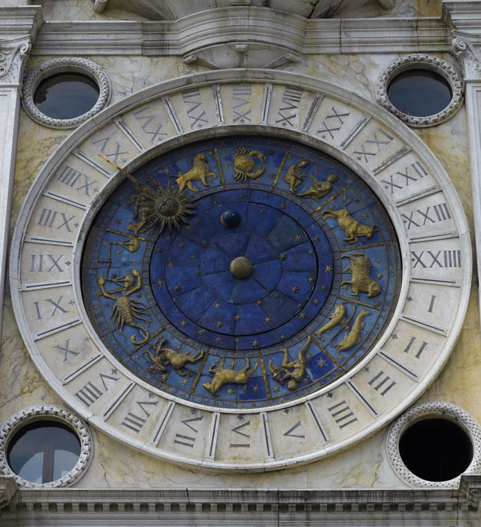 Detailed view of the Zodiac Clock at St Mark's Clocktower in Venice, showcasing astrological signs.